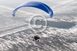 Aerial view paramotor buggy or motorized paraglider seen from th